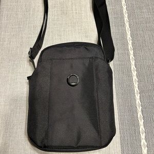 Travel/ crossbody bag unisex. Barely used